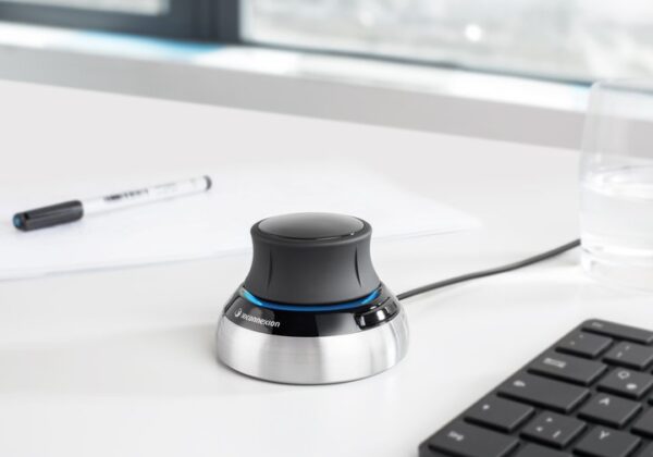 A computer mouse sitting on top of a desk.